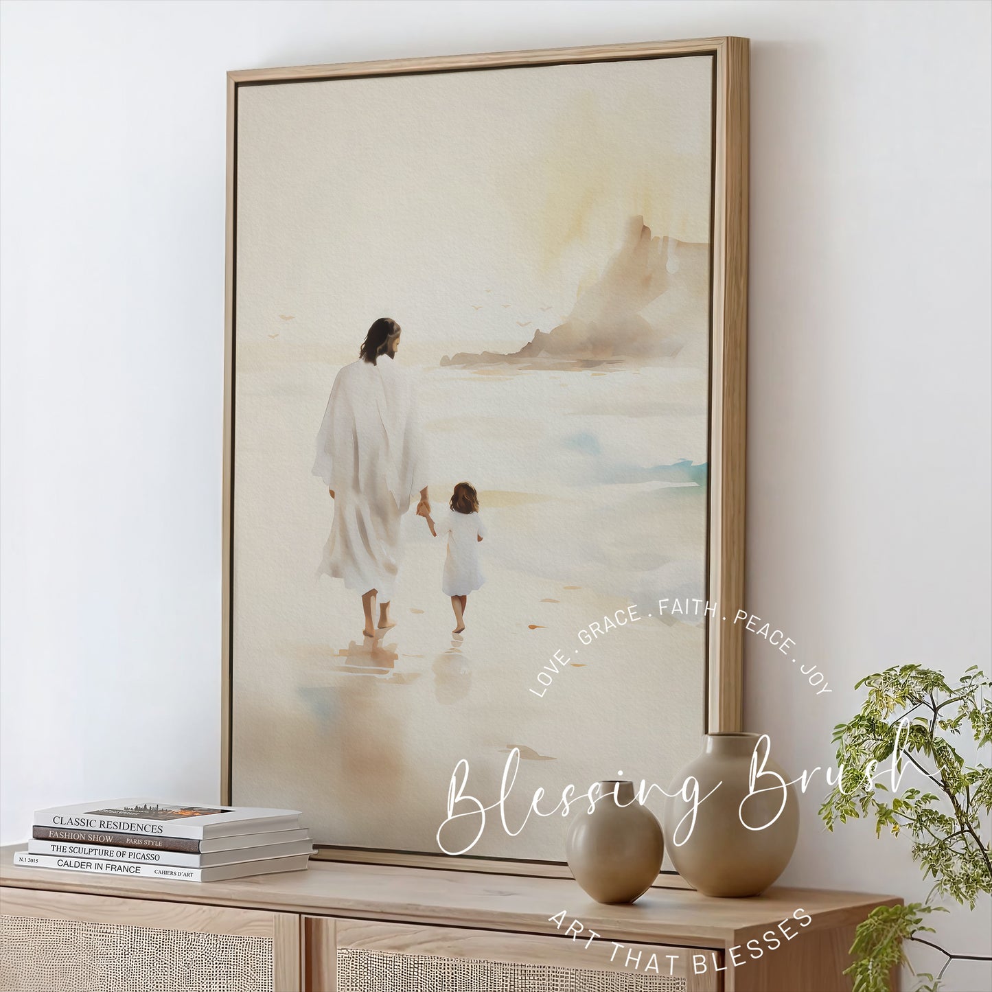 Watercolor painting of Jesus holding hands with a little girl while walking along the beach, framed Christian canvas wall art in soft neutral tones, Blessing Brush.